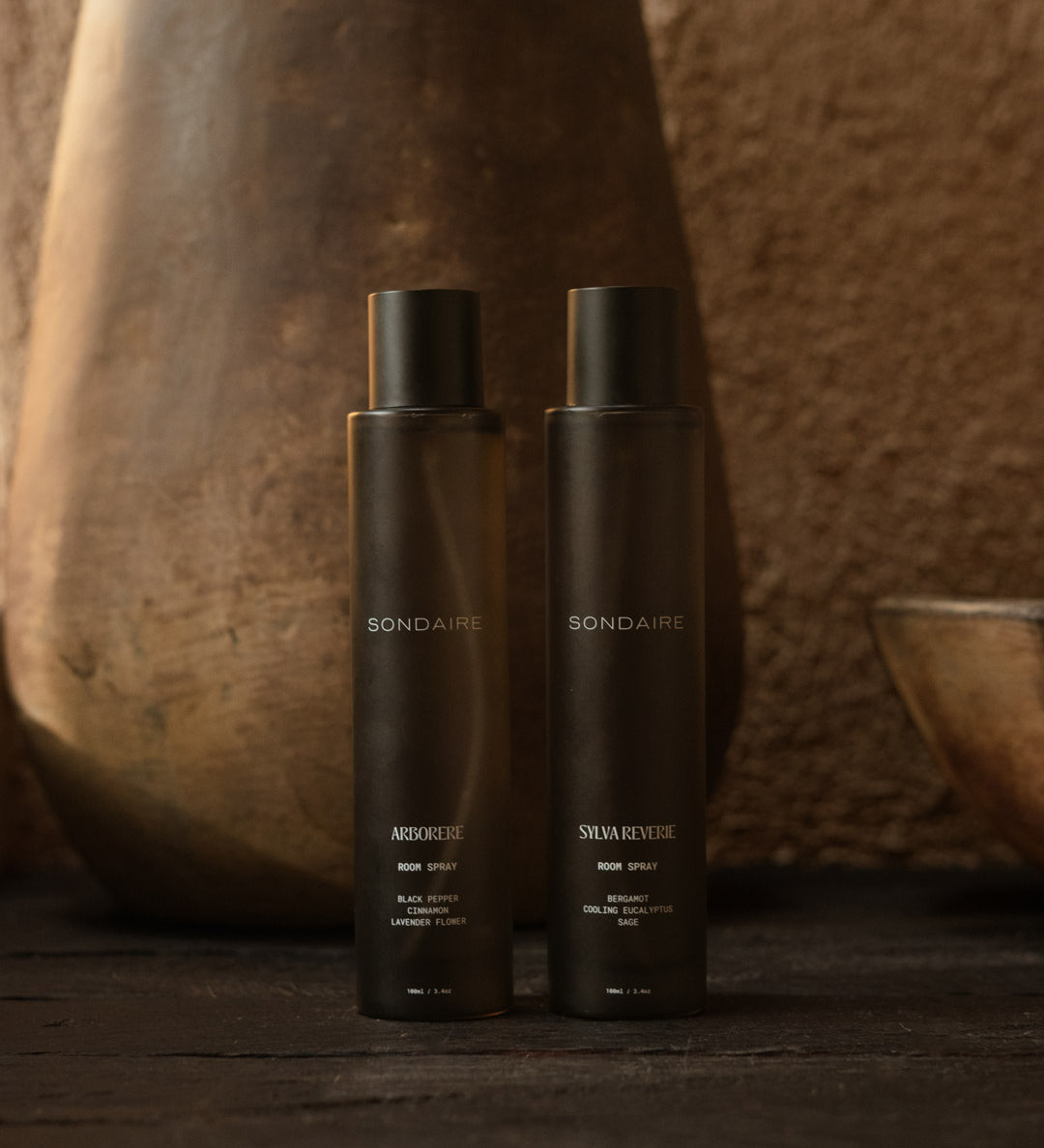 Sondaire Ritual Set room sprays styled in a warm home interior
