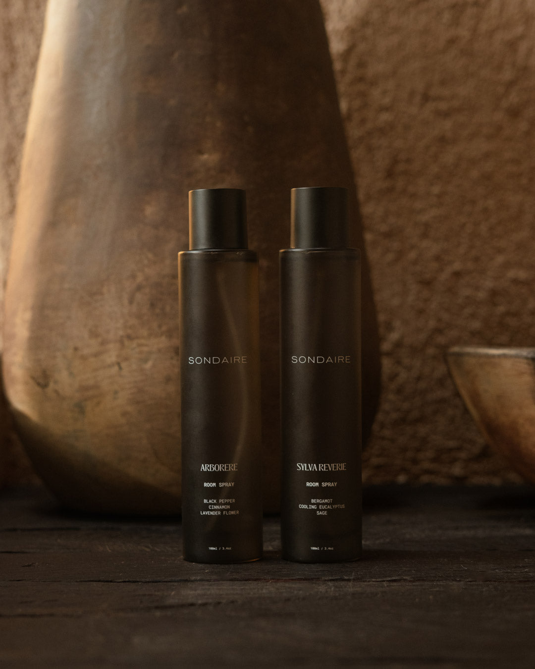 Sondaire Ritual Set room sprays styled in a warm home interior